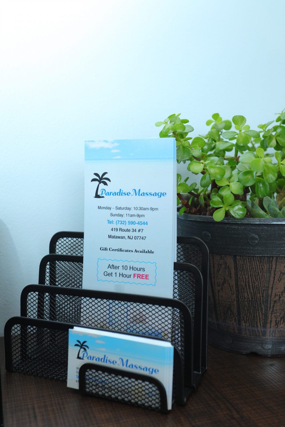 Paradise Massage loyalty offer and business cards