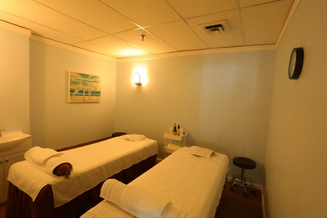 A couples treatment room with two tables at Paradise Massage in Matawan, NJ